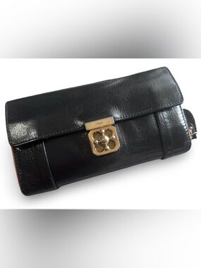 Chloé Elsie continental wallet  in black leather with gold-tone hardware.